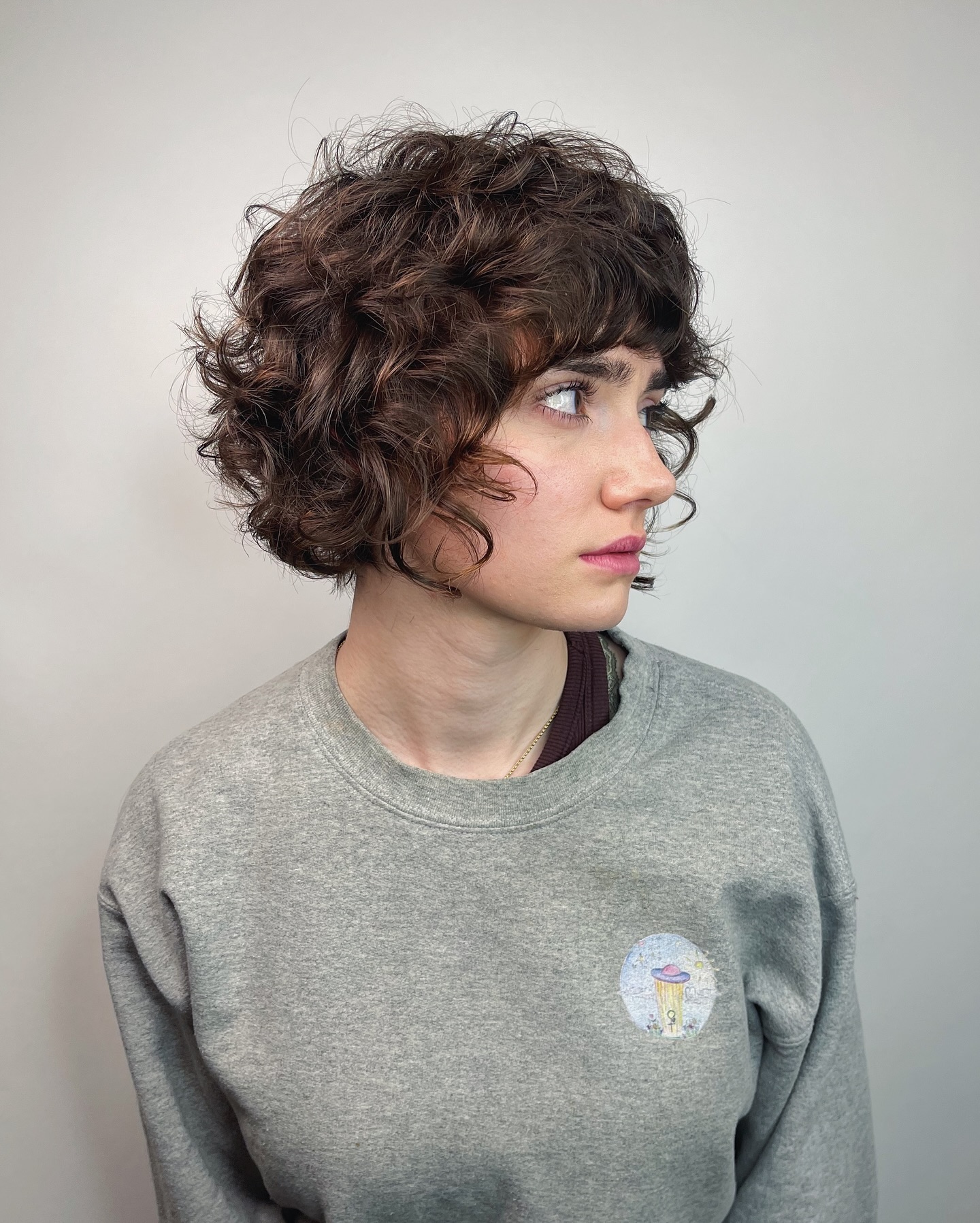 13. Shaggy Curly Bob with Bangs