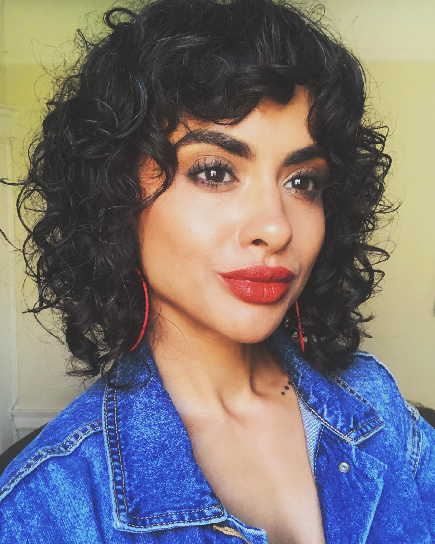 14. Shaggy Curly Bob with Bangs