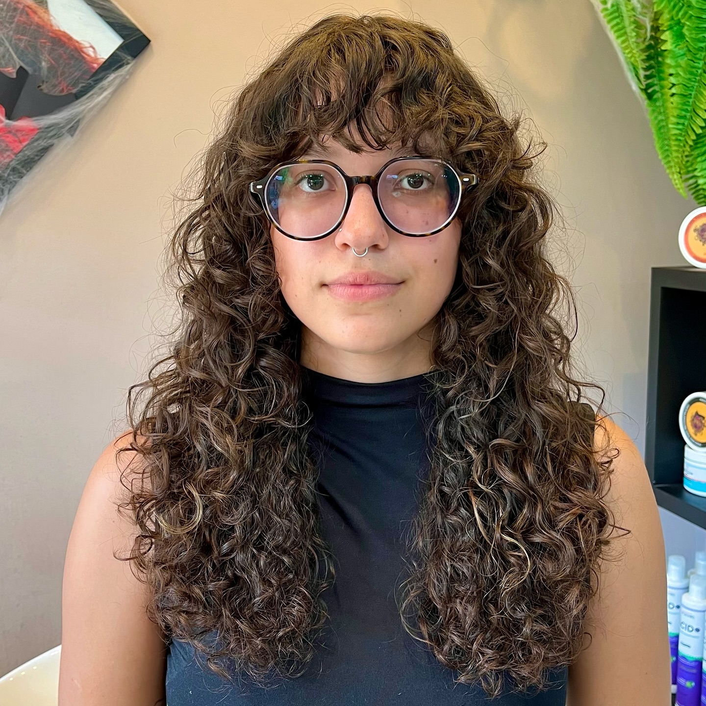 25. Shaggy Curly Hair with Bangs