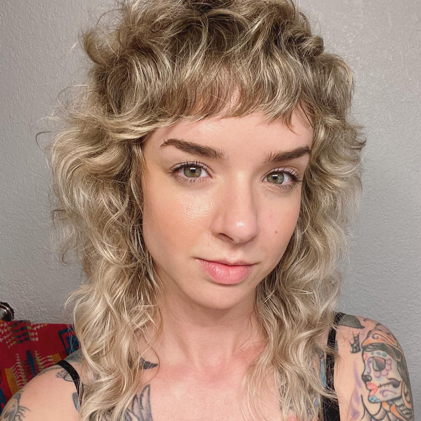 15. Shaggy Curly Bob with Bangs