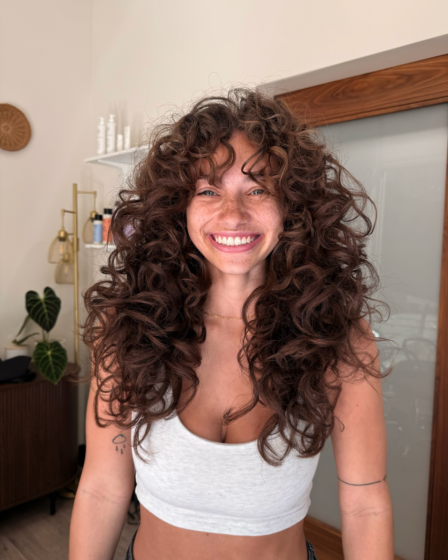 17. Shaggy Curly Haircut with Defined Layers