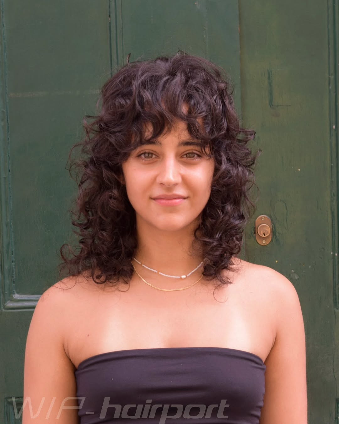 18. Shaggy Curly Hairstyle with Defined Layers